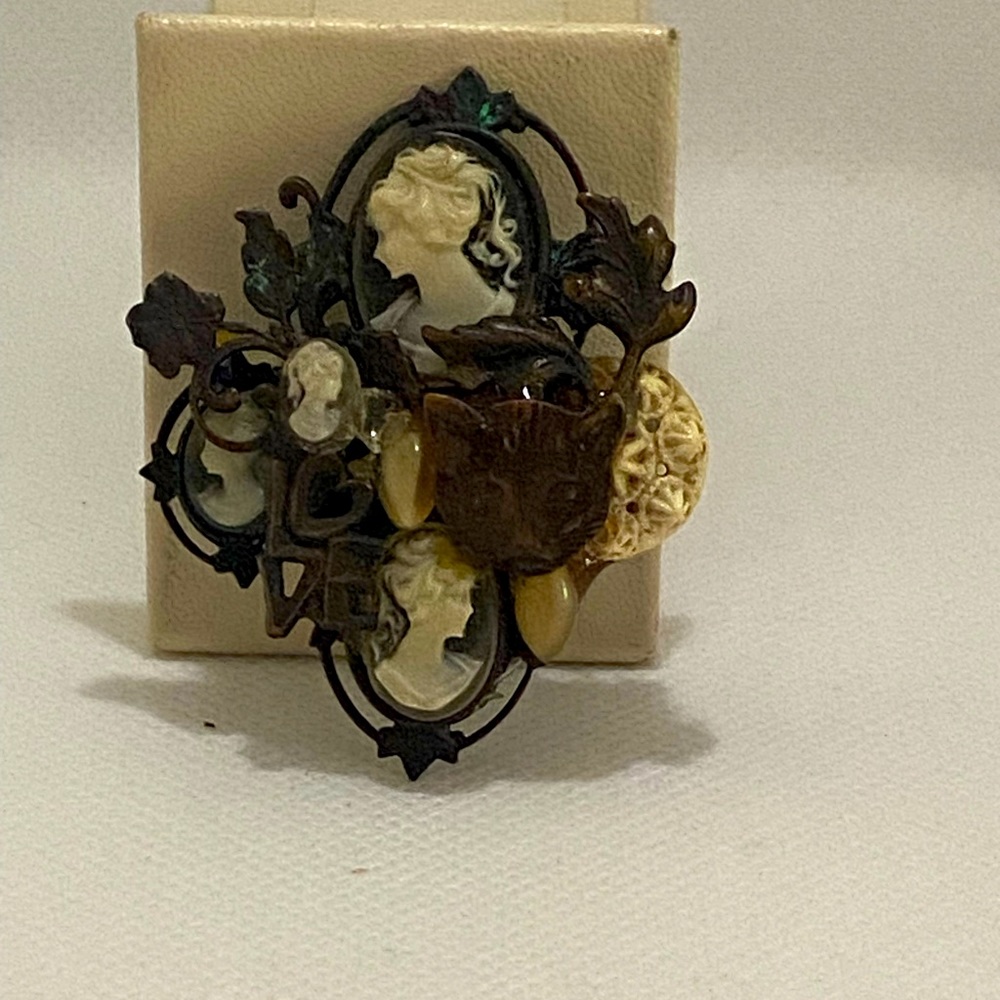 Signed Lisa Carlson cameo brooch update with a floral button, cat head & love.